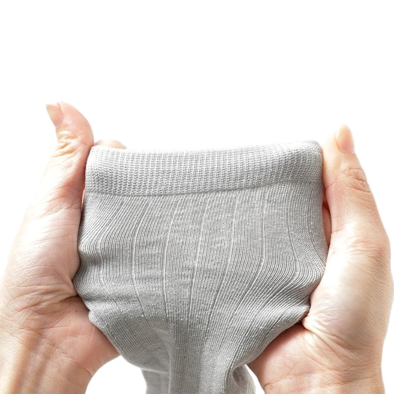 Men's ramie sock cuff stretched to show the knit and elasticity