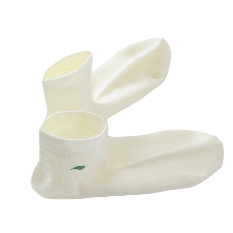 Women's ramie socks laid flat, three pairs showing the shape and cuff